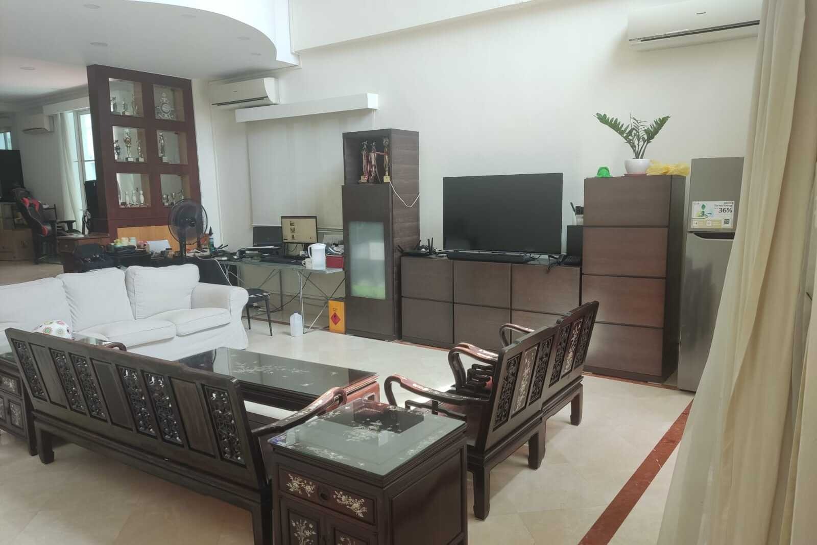A cozy living room at the center of the home, designed for comfort and connection, reflecting the welcoming environment at Einstein International.